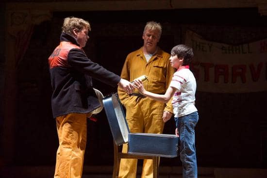 Tony (Kevin Wathen) Gives Billy (Ali Rasul) A Miner's Lamp as Dad (Deka Warmsley) Looks On