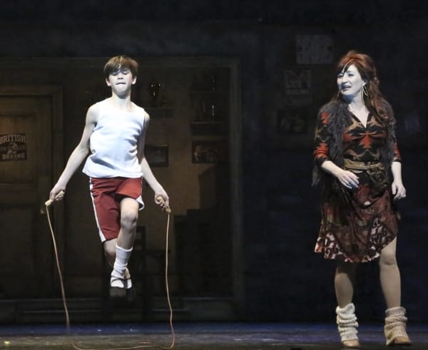 Mitchell Tobin (Billy) and Vicki Lewis (Mrs. Wilkinson) in Born to Boogie