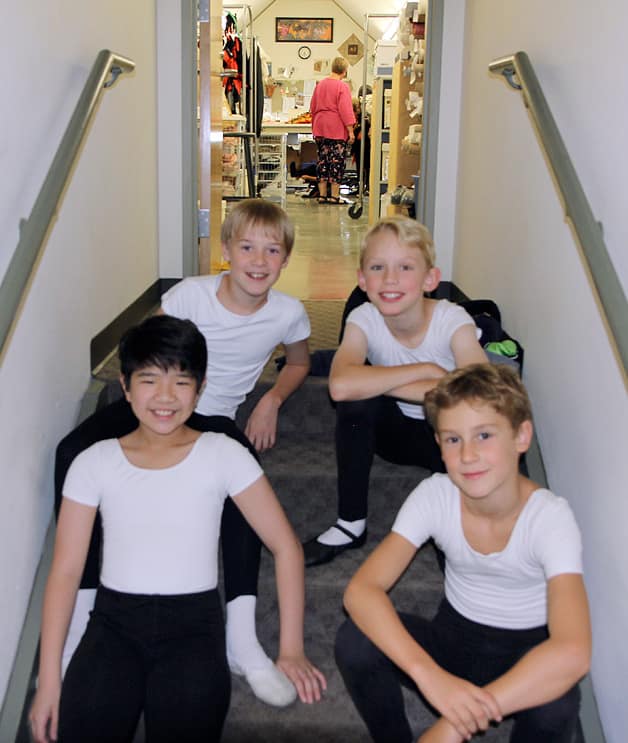 In a rest break from rehearsing The Nutcracker. Vincent is lower right in the photo. Fellow Village Theatre Billy Philipp Mergener is seated on the step just behind Vincent.