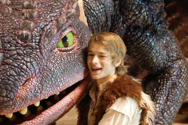 Rarmian as 'Hiccup' poses with his dragon 'Toothless' in "How to Train your Dragon"