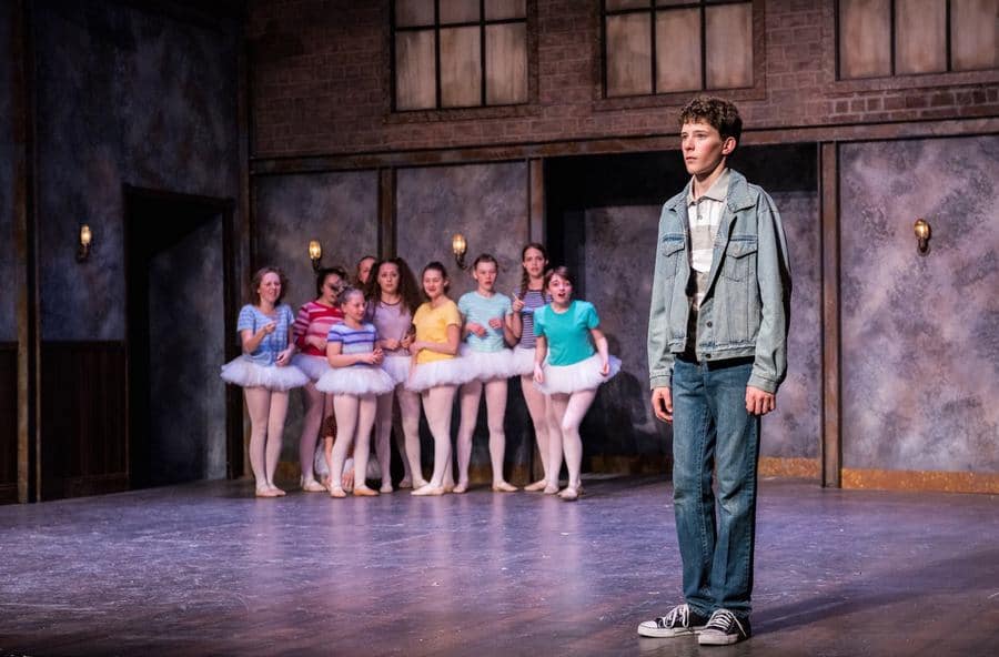 Billy (Seamus Whyte) and the Ballet Girls