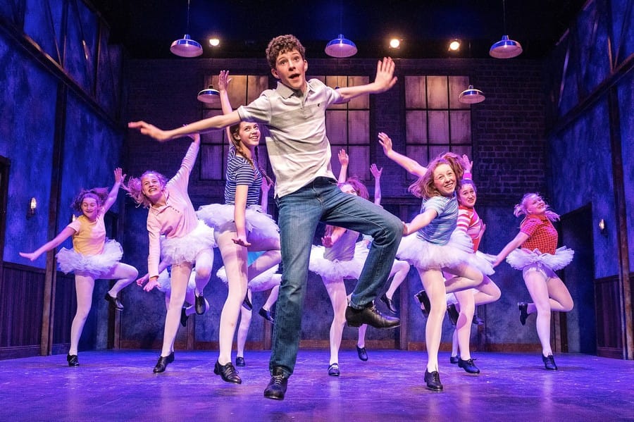 Billy (Seamus Whyte) and the Ballet Girls