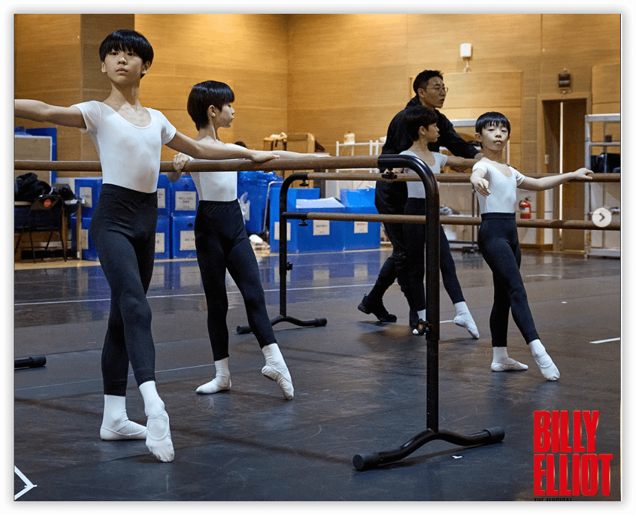 The Billys warm up at the ballet barre